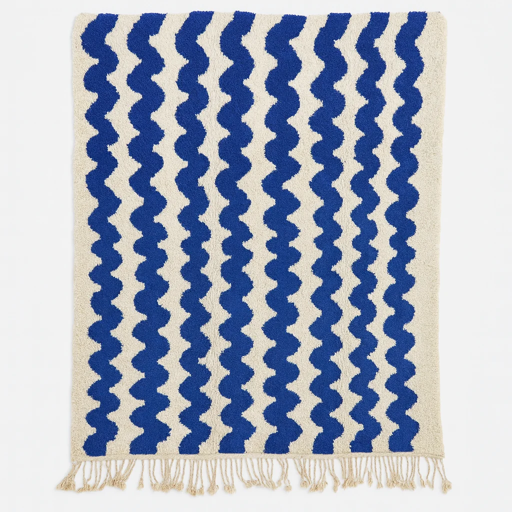Blue and white Moroccan wool rug with wavy Berber pattern
